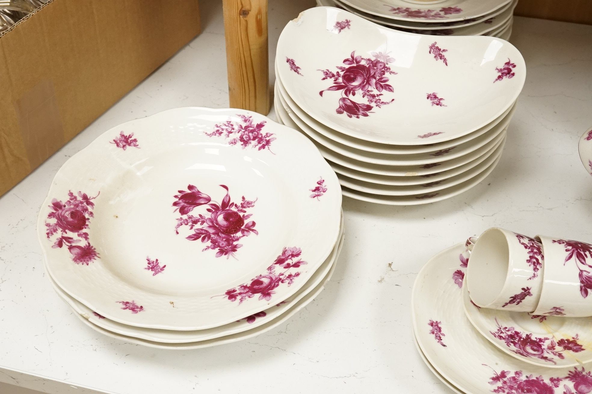 A Theodore Haviland, Paris, part dinner service, printed in puce monochrome